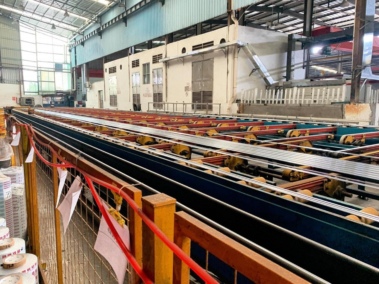 Run-out table where extruded aluminium profiles leave the press